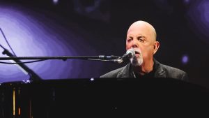 Billy Joel during a documentary interview discussing personal struggles