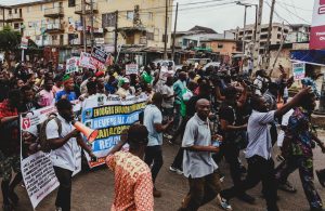 Kenyans protest in Nairobi against President William Ruto’s economic policies and police brutality, demanding justice and transparency in governance.