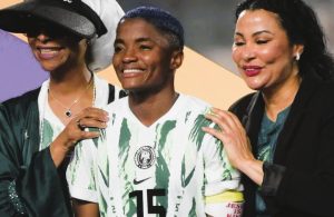 Nigerian President Bola Tinubu celebrates with Super Falcons players at the presidential reception after their WAFCON victory.