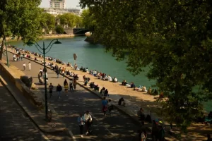 After 100 years, the River Seine reopens for public swimming in Paris, following a €1.4 billion cleanup ahead of the 2024 Olympics.