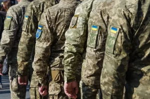 ALT text: A damaged wooded training ground in Ukraine following a Russian missile strike that caused multiple casualties among military personnel.