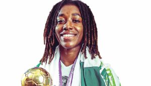 Jennifer Echegini celebrating after scoring the winning goal in the WAFCON final against Morocco.
