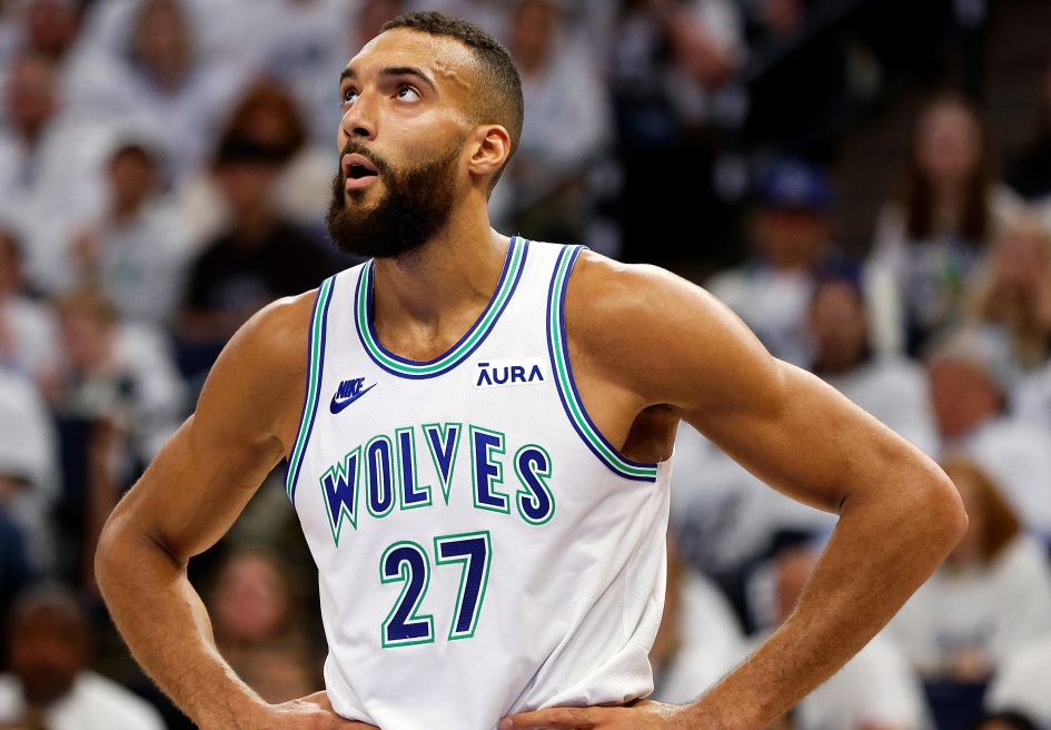 Minnesota Timberwolves center Rudy Gobert almost hit by falling piece of scoreboard during game