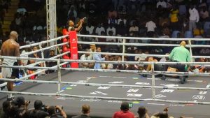 American boxer Andrew Tabiti celebrates after knocking out Ghana’s Jacob Dickson at Bukom Boxing Arena to win the WBO Africa Bridgerweight title.