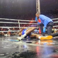 Ahmed Abdula raises his gloves in victory as the crowd celebrates his cruiserweight title win at Bukom Boxing Arena.