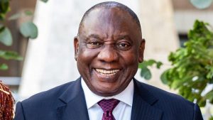South African President Ramaphosa speaks with officials during a visit to a flood-damaged area in Eastern Cape.