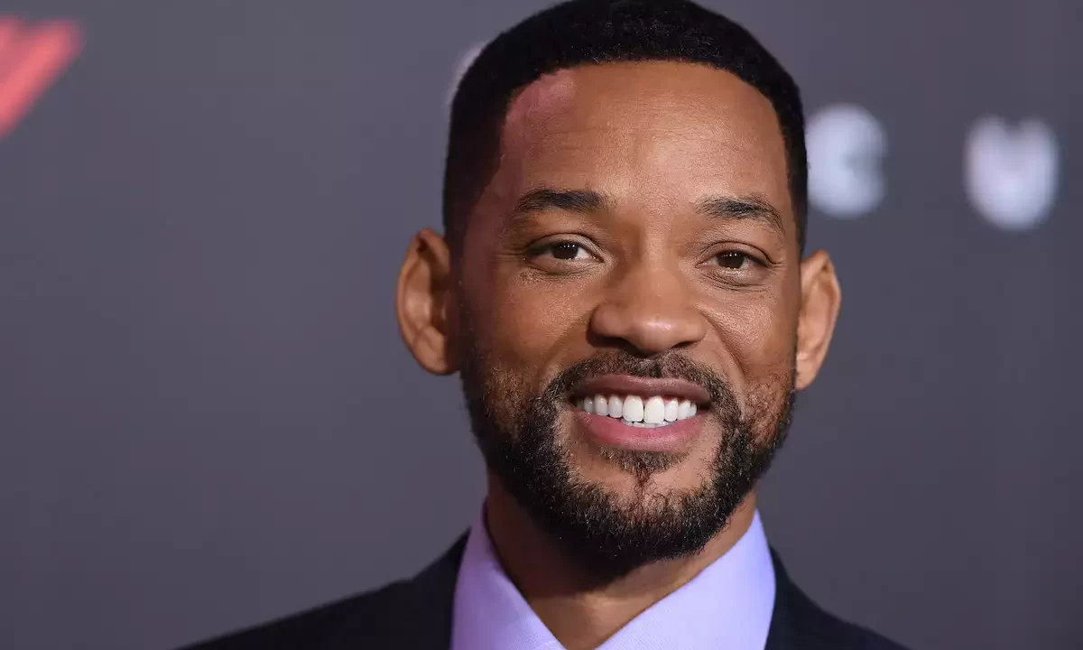 Will Smith in a reflective pose during a radio interview discussing his journey post-Oscars controversy.