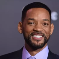 Will Smith in a reflective pose during a radio interview discussing his journey post-Oscars controversy.