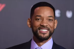 Will Smith in a reflective pose during a radio interview discussing his journey post-Oscars controversy.