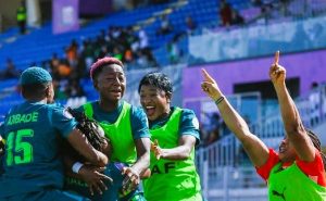 Nigerian women's football team celebrating a late goal against South Africa during WAFCON 2024 semi-final
