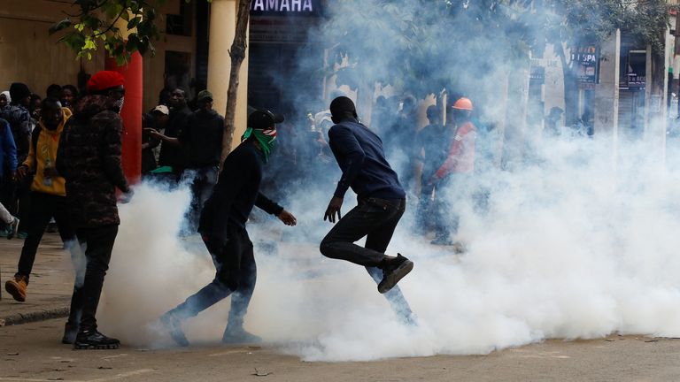 Kenyan protesters clash with police during Saba Saba demonstrations in Nairobi on July 7, 2025, amid heavy security and road closures.
