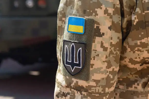 ALT text: A damaged wooded training ground in Ukraine following a Russian missile strike that caused multiple casualties among military personnel.