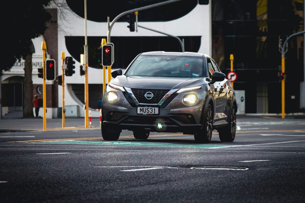 Nissan Rosslyn plant exterior in Pretoria, South Africa, under cloudy skies amid global restructuring concerns.