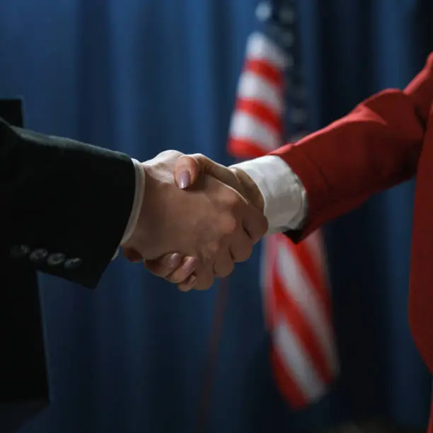 Donald Trump and Ursula von der Leyen shake hands at Turnberry golf course after reaching a trade deal between the US and EU.