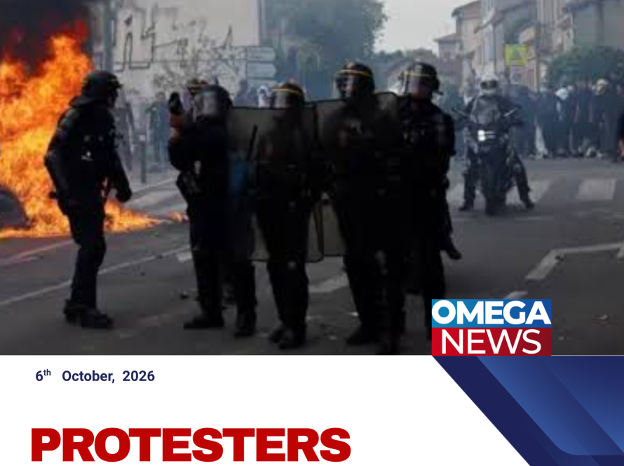 French students protest outside a high school as police monitor demonstrations in France.